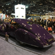A very large, very purple Rolls.